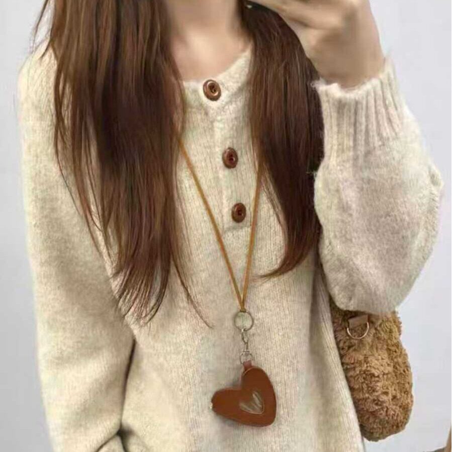 sd20250070 ヘンリーネックボタンニット